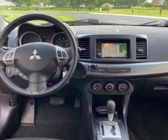 2011 Mitsubishi Lancer ES sport with 128k miles.