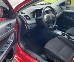 2011 Mitsubishi Lancer ES sport with 128k miles.